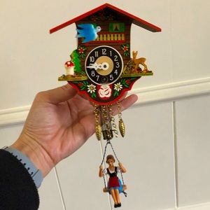 Vintage Linden hanging woman cuckoo clock.